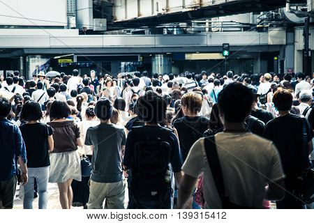 Asian People Are Across The Crosswalk