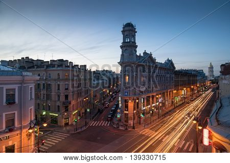 ST. PETERSBURG, RUSSIA - JUNE 21, 2015: Popular road crossing called Five Corners. One of symbols of city is Apartment house with turret