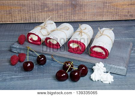 a biscuit roll wraped in a lace napkin