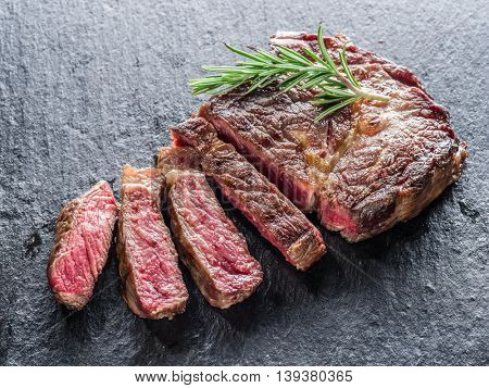 Medium Ribeye steak on the graphite tray.