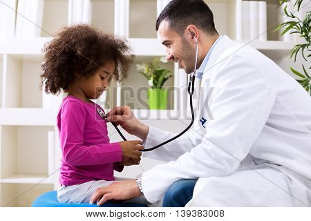Pediatrician And Little African Girl