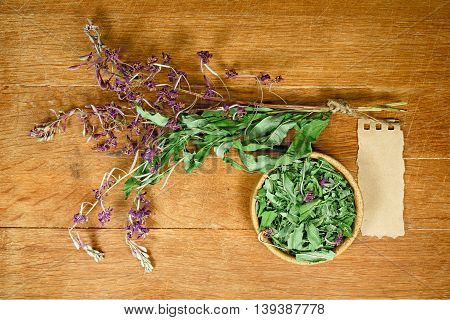 Fireweed.Dried herbs for use in alternative medicine.Herbal medicine phytotherapy medicinal herbs.For preparation of infusions decoctions tinctures powders ointments tea.Background green cloth