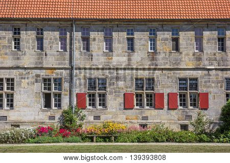 Bench And Flowers At The Frenswegen Monastery In Nordhorn