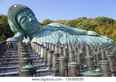 The bronze statue of reclining Buddha state at Nanzoin Temple in Sasaguri, Fukuoka, Japan.This is the bigest lying statue in the world.