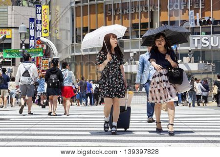 TOKYO, JAPAN - May 18, 2016: Shibuya, It's the shopping district which surrounds Shibuya railway station. This area is known as one of the fashion centers and major nightlife of Japan on May 18, 2016.