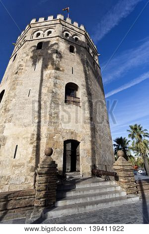 Facade of the Torre del Oro (Tower of the Gold) a dodecagonal military watchtower in Seville Spain