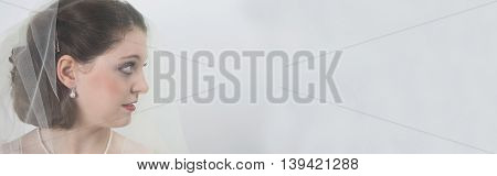 Bride against white background with veil banner-Proportionate to Large Mobile Banner