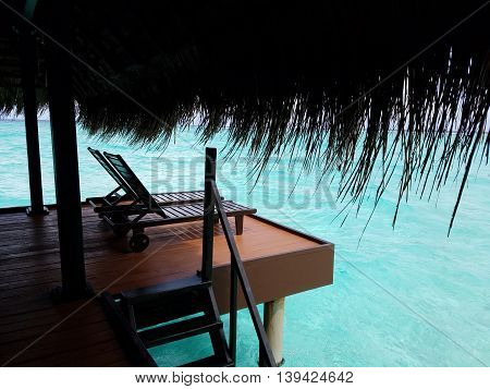 Outdoor relaxing deck of the water bungalow