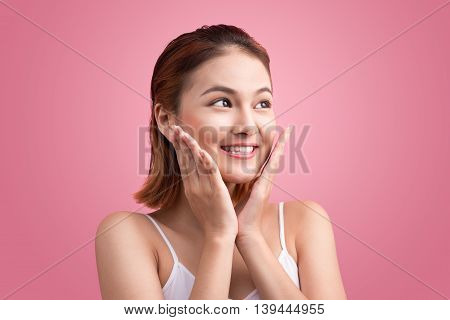 Beautiful Asian Woman with Clean Fresh Skin. Beautiful Spa Woman Smiling. Pure Beauty Model. Youth and Skin Care Concept