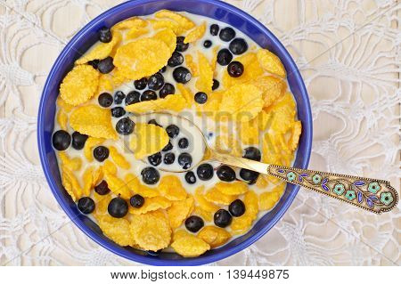 Cornflakes with Bilberry and Chocolate. Healthy Breakfast Studio Photo