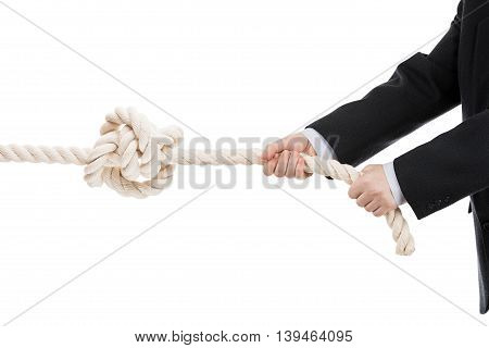 Business Man Hand Holding Or Pulling Rope With Tied Knot