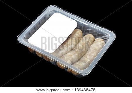 kupaty (bratwursts) in modified atmosphere packaging (MAP) on the black background