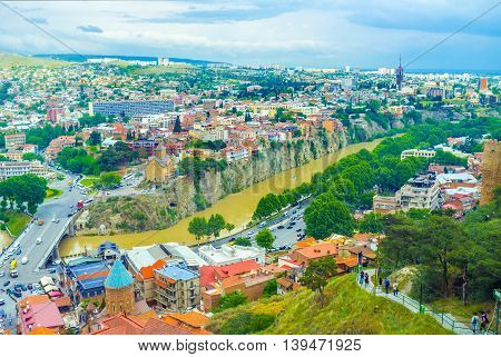 The view on Kura River and its rocky shores from the Sololaki Hill Tbilisi Georgia.