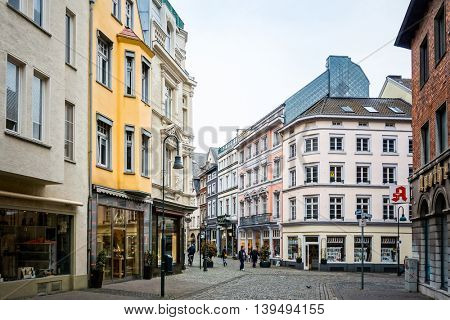 Aachen, Germany - April 13 : Tourists on foot Street in Aachen, Germany. Aachen was a residence of Charlemagne, and later the coronation place for German kings. April 13, 2016 in Aachen, Germany