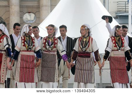 ZAGREB, CROATIA - JULY 22: Members of folk group Etnos from Skopje, Macedonia during the 50th International Folklore Festival in center of Zagreb, Croatia on July 22, 2016