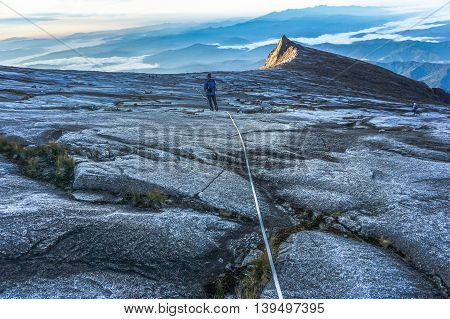 Ranau,Sabah Borneo-March 13,2015:Mountain KInabalu climber move down from Low's Peak to Sayat Sayat check point at Mountain Kinabalu.Sabah Land Below the Wind.