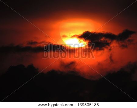 Intense, red, orange sunset in Macritchie Reservoir, Singapore