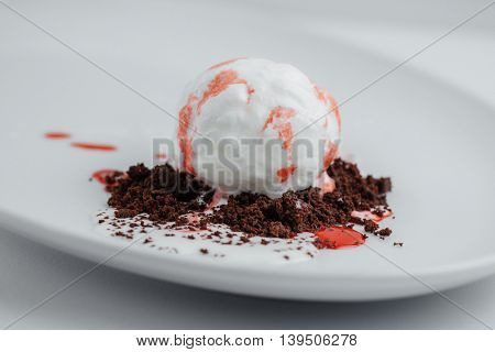 Ice Cream With Strawberry Syrup And Chocolate Chips Closeup