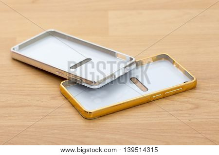 picture of a Case for smartphone. Isolated on wood background