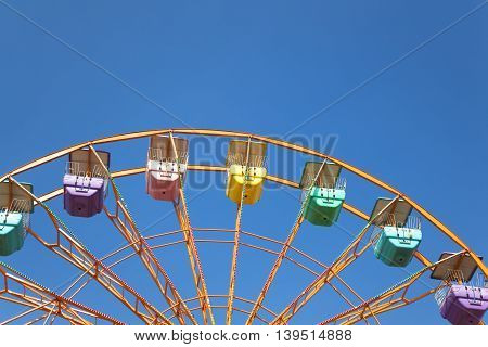 A Image Of Ferris Wheel And Blue Sky Background