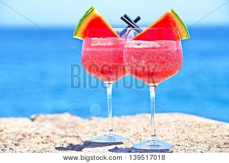 refreshing fruit cockail with watermelon in big glasses for summer parties