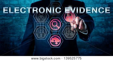 Male forensic examiner is pushing ELECTRONIC EVIDENCE on an interactive touch screen. Information technology concept. Business metaphor for evidence law computer law and digital forensics.