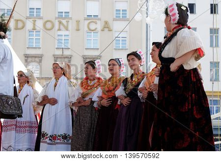ZAGREB, CROATIA - JULY 23: Members of folk group Kolo from Donja Bebrina, Croatia  during the 50th International Folklore Festival in center of Zagreb, Croatia on July 23, 2016