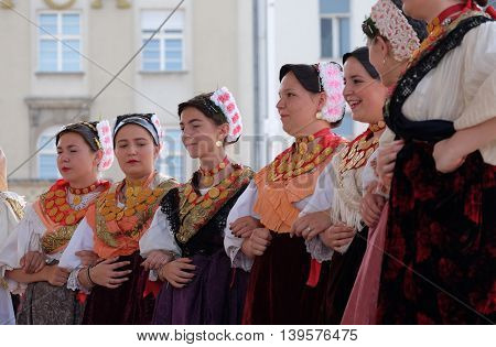 ZAGREB, CROATIA - JULY 23: Members of folk group Kolo from Donja Bebrina, Croatia  during the 50th International Folklore Festival in center of Zagreb, Croatia on July 23, 2016