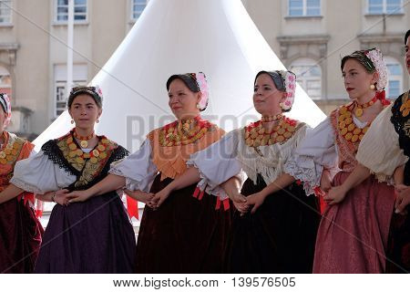 ZAGREB, CROATIA - JULY 23: Members of folk group Kolo from Donja Bebrina, Croatia  during the 50th International Folklore Festival in center of Zagreb, Croatia on July 23, 2016
