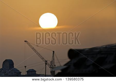 the a golden sunset over the city