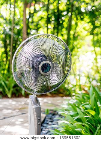 The electric table fan in the garden