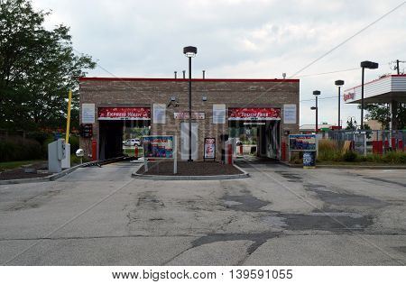 SHOREWOOD, ILLINOIS / UNITED STATES - AUGUST 30, 2015: One may have one's car washed at the Speedway gasoline station in Shorewood.