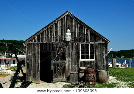 Mystic Connecticut- July 11 2015: The wooden ClamShack with a white figurehead on the tympanum at Mystic Seaport