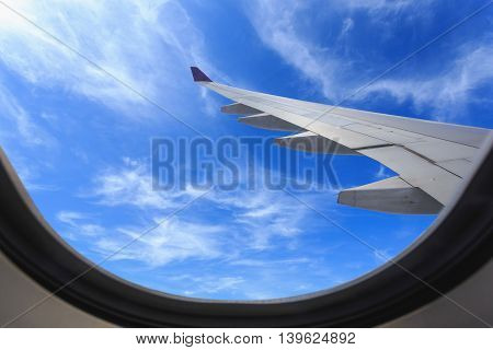 View Of Beautiful Cloud And Wing Of Airplane From Window
