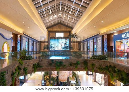 MACAO, CHINA - FEBRUARY 16, 2016: inside of Shoppes at Sands Cotai Centra. Shoppes at Sands Cotai Central is a large shopping mall in Macao