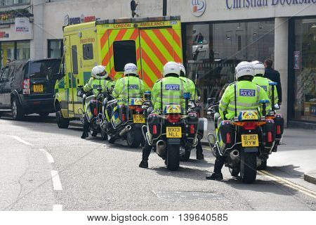 CITY OF LONDON ENGLAND 13 March 2015: Police Motorcyclists from behind