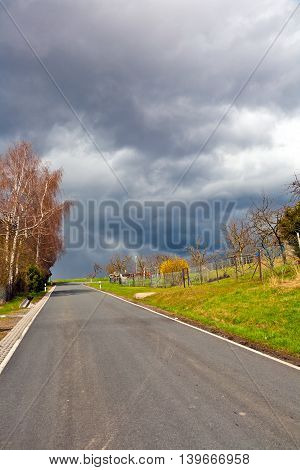 Street With Dark Clouds And Heavy Rain