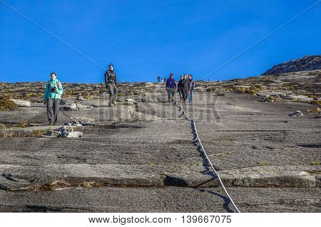 Ranau,Sabah Borneo-March 13,2016:Group of climbers move down to Laban Rata after succesfully completed conquering the summit of the majestic mountain Kinabalu,which the highest mountains in Asean.