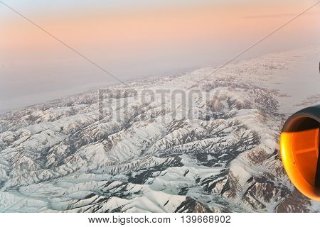 Beautiful View From The Aircraft To The Mountains In Tashkent, China And Kirgistan And Aircraft Turb