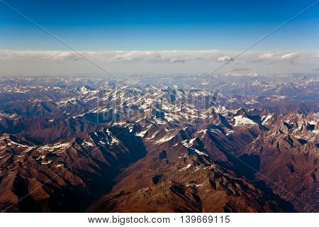 Beautiful View From The Aircraft To The Mountains Of The Himalaya On Chinese Tibetan Side Snow