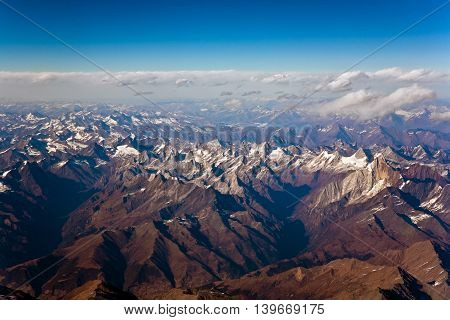 Beautiful View From The Aircraft To The Mountains Of The Himalaya On Chinese Tibetan Side Snow