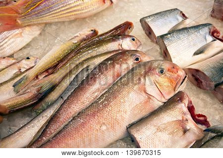 Whole Fresh Fishes Are Offered In The Fish Market In Asia