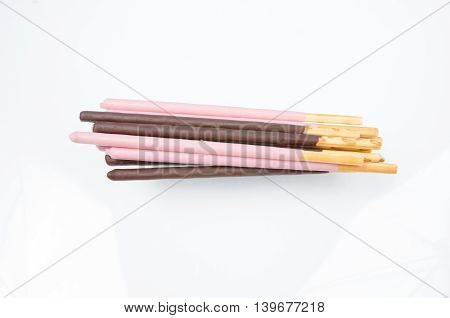 Japanese snack food biscuit stick strawburry and chocolate coated on white background