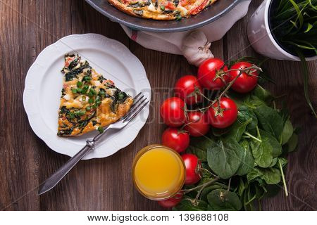Frittata With Spinach, Tomatoes And Cheese