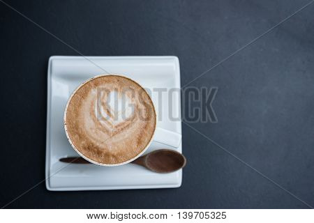 hot fresh coffee in white cup on black table and white saucer cappuccino coffee mocha coffee espresso coffee latte coffee
