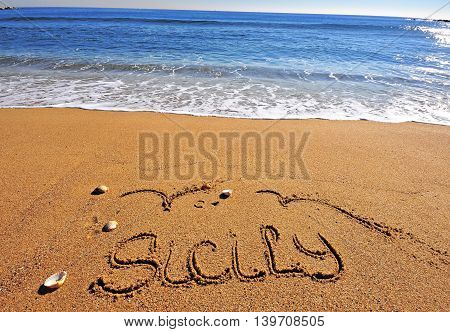 The Sicily sign on the sand beach