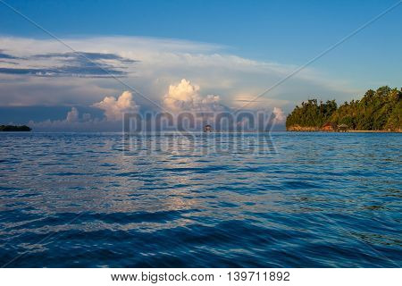 Panoramic View Bungalow in Indonesia Village Tropical Beach in Bali Island Sunset. Summer Season Caribbean ocean. Horizontal Picture