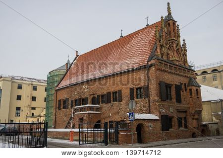 Kaunas, Lithuania - January 3, 2016: Brick medieval The House of Perkunas (Thunder) built in 15th century is the oldest structure in Kaunas Lithuania