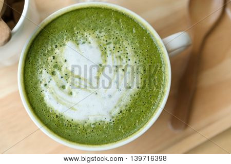 Hot Green Tea Set On A Wooden Table In A Coffeshop