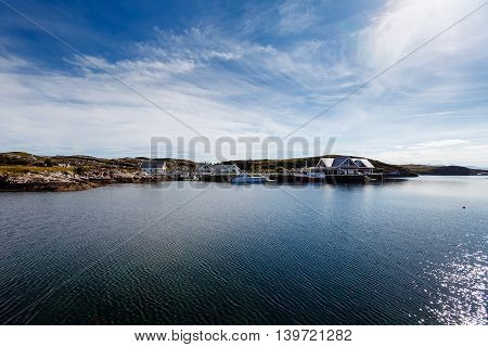 Beautiful view on nowegian fjords and seaside houses. Tranquil scene.